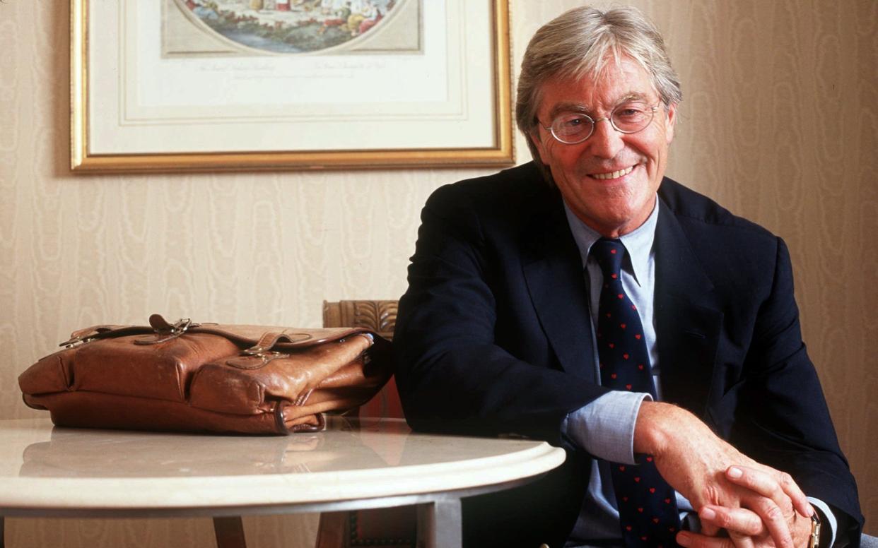 In this June 20, 1997 file photo, author Peter Mayle appears in New York. Mayle, the British author known for his books set in Provence, France, died in a hospital near his home in the south of France - AP