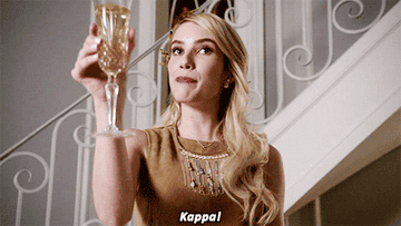 From 'Scream Queens': four young women raise glasses of champagne and say "Kappa!"