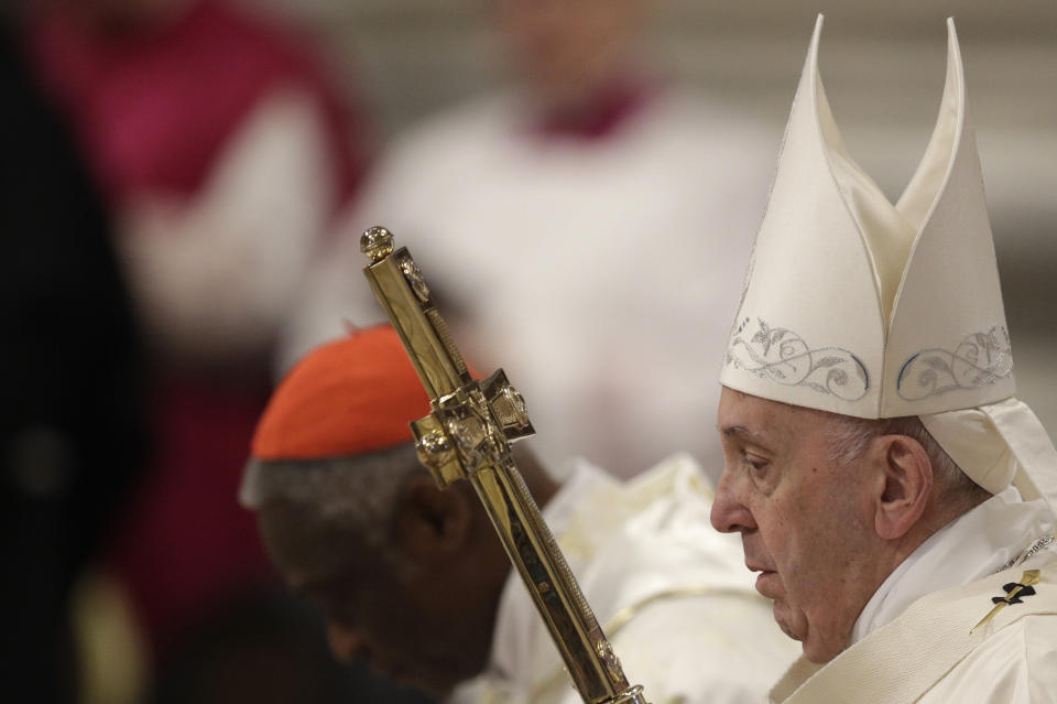 Pope Francis presides over a Mass for the solemnity of St. Mary at the beginning of the new year, in St. Peter's Basilica at the Vatican, Wednesday, Jan. 1, 2020. (AP Photo/Gregorio Borgia)