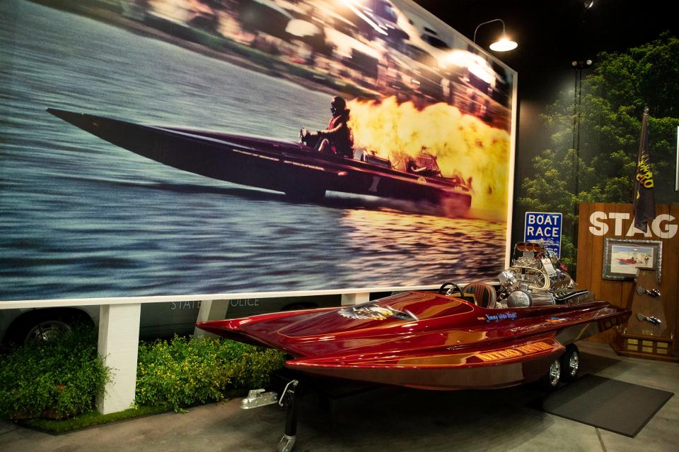 A large photo and racing boat driven by his driver Jimmy Wright from Rick Hendrick's boat racing days is on display inside of Rick Hendrick's 58,000-square-foot Heritage Center in Concord, North Carolina, on July 25, 2023.