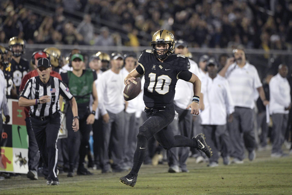 McKenzie Milton (10) aims to rehab until he gets back to the Heisman-contending quarterback that he was during the 2018 season. (AP)