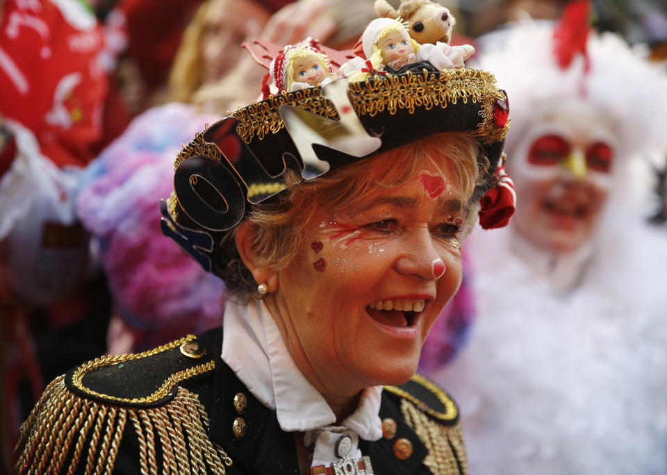 <p>Carnival revellers celebrate during “Weiberfastnacht” (Women’s Carnival) in Cologne, Germany on Feb. 23, 2017, marking the start of a week of street festivals with the highlight “Rosenmontag”, Rose Monday processions. (Photo: Wolfgang Rattay/Reuters) </p>