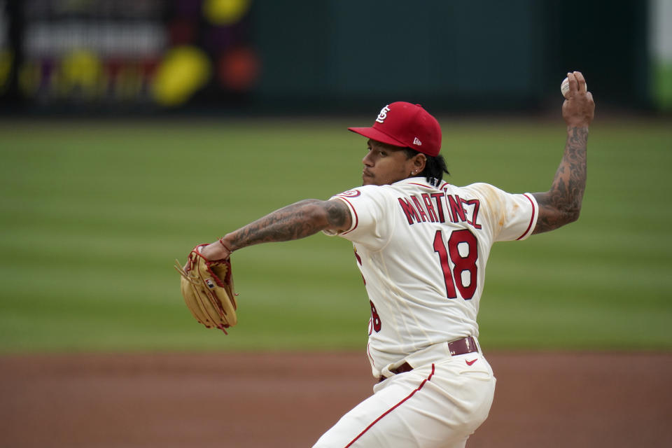 St. Louis Cardinals starting pitcher Carlos Martinez throws during the first inning of a baseball game against the Colorado Rockies Saturday, May 8, 2021, in St. Louis. (AP Photo/Jeff Roberson)