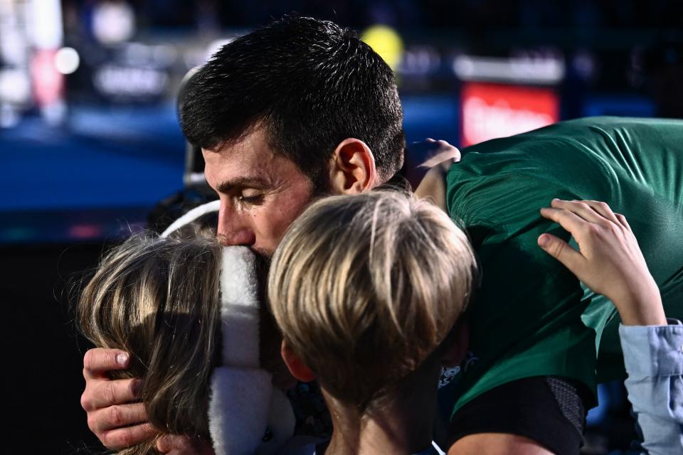 Novak Djokovic, pictured here celebrating with his children after winning the ATP Finals.