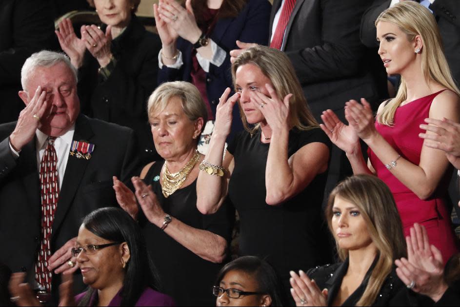 Carryn Owens, widow of widow of Chief Special Warfare Operator William “Ryan” Owens, wipes her eyes on Capitol Hill in Washington, Tuesday, Feb. 28, 2017, as she was acknowledged by President Donald Trump during his address to a joint session of Congress. (AP Photo/Pablo Martinez Monsivais)