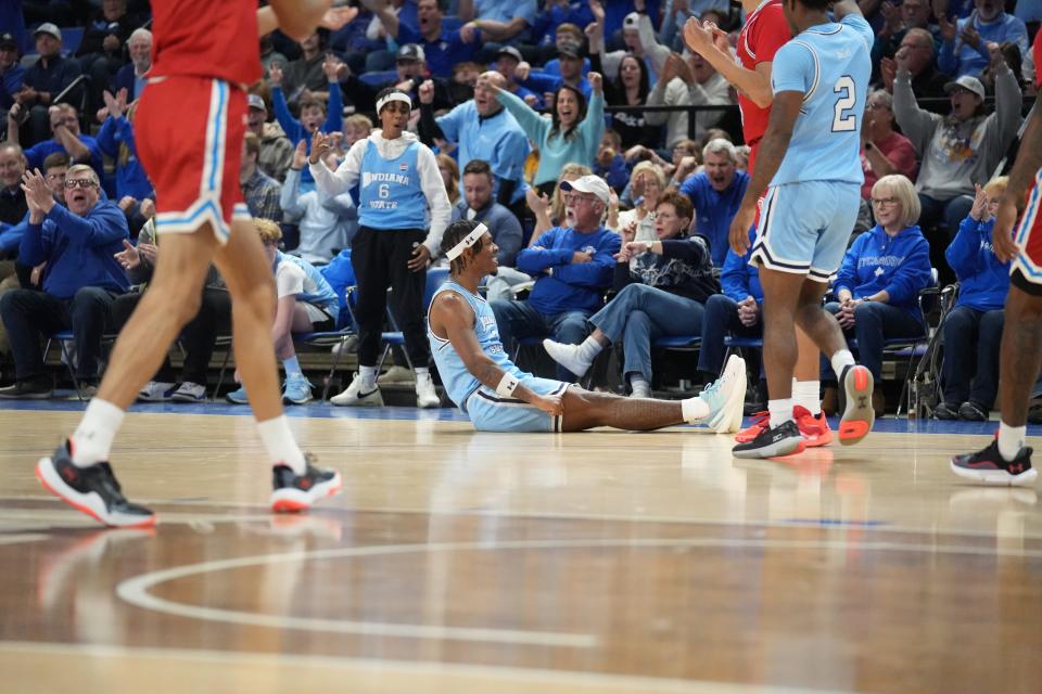 Pike grad Ryan Conwell reacts after hitting a 3-pointer and being fouled for a 4-point play in Indiana State's home win over Bradley on Saturday.