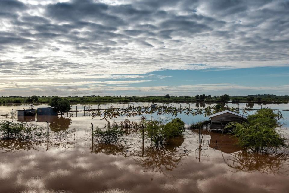 PHOTO: Farmland and houses are covered on water in an inundated area following flash floods in Garissa, Kenya, Nov. 21, 2023.  (Luis Tato/AFP via Getty Images)