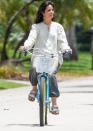 <p>Camila Cabello goes for a solo morning bike ride through Miami on Wednesday. </p>
