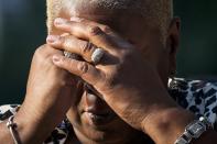 Chundera Epps, sister of victim Christopher Epps, mourns during the ringing of the first bell during the 9/11 Memorial ceremonies marking the 12th anniversary of the 9/11 attacks on the World Trade Center in New York on September 11, 2013. (REUTERS/Adrees Latif)