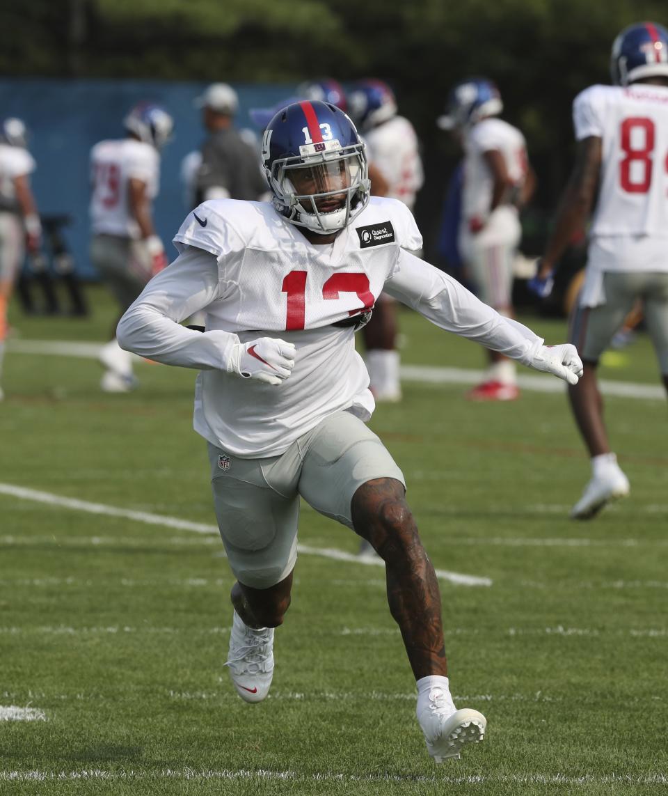 New York Giants receiver Odell Beckham Jr., runs through a drill at the Detroit Lions football camp, Wednesday, Aug. 15, 2018, in Allen Park, Mich. (AP Photo/Carlos Osorio)