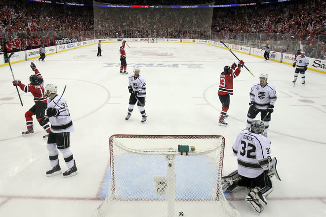 NEWARK, NJ - JUNE 09: Alexei Ponikarovsky #12 and David Clarkson #23 of the New Jersey Devils celebrate after Bryce Salvador #24 scores a goal in the second period against Jonathan Quick #32 of the Los Angeles Kings during Game Five of the 2012 NHL Stanley Cup Final at the Prudential Center on June 9, 2012 in Newark, New Jersey. (Photo by Elsa/Getty Images)