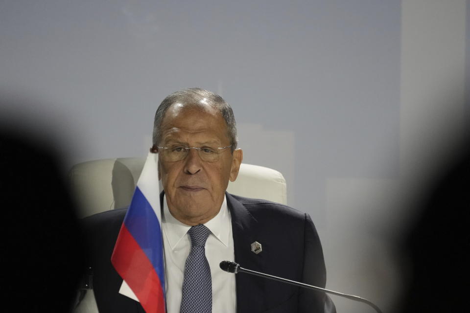 Russia's Foreign Minister Sergei Lavrov listens to South African President Cyril Ramaphosa deliver the XV BRICS summit declaration in Johannesburg, South Africa, Thursday, Aug. 24, 2023. (AP Photo/Themba Hadebe)