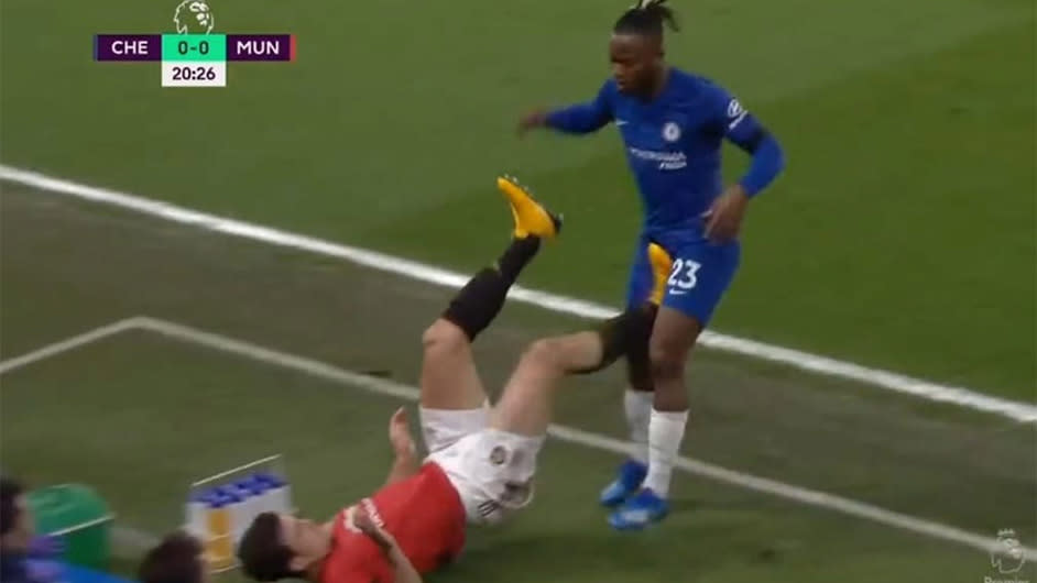 Harry Maguire appears to clash with Michy Batshuayi but VAR ruled no foul.