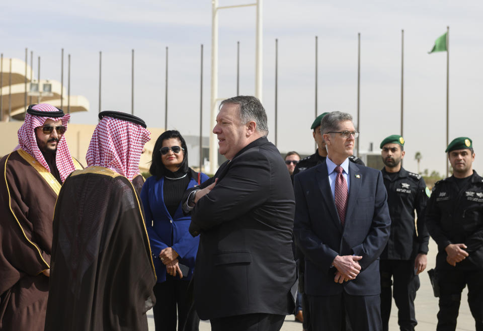 U.S. Secretary of State Mike Pompeo, center, is accompanied by Saudi Minister of State for Foreign Affairs Adel al-Jubeir, secod left, as he departs from Saudi Arabia's King Khalid International, in Riyadh, Monday, January 14, 2019. U.S. Secretary of State Mike Pompeo is in Saudi for talks on a range of Mideast crises topped by the conflicts in Syria and Yemen, threats from Iran and the Saudi response to the murder of Washington Post columnist Jamal Khashoggi last year. (Andrew Cabellero-Reynolds/Pool via AP)