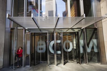 A woman exits the Viacom Inc. headquarters in New York April 30, 2013. REUTERS/Lucas Jackson