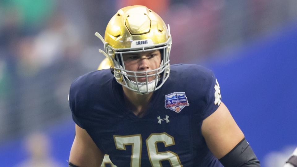 Jan 1, 2022; Glendale, Arizona, USA; Notre Dame Fighting Irish offensive lineman Joe Alt (76) against the Oklahoma State Cowboys in the 2022 Fiesta Bowl at State Farm Stadium. Mandatory Credit: Mark J. Rebilas-USA TODAY Sports