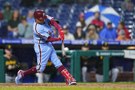 Philadelphia Phillies' Ronald Torreyes hits a three-run home run against Pittsburgh Pirates pitcher Anthony Banda during the sixth inning of a baseball game, Thursday, Sept. 23, 2021, in Philadelphia. (AP Photo/Matt Slocum)