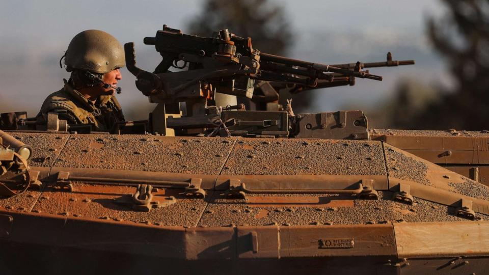 PHOTO: An Israeli soldier looks out from a tank during a military drill near Israel's border with Lebanon in northern Israel, Oct. 26, 2023. (Lisi Niesner/Reuters)