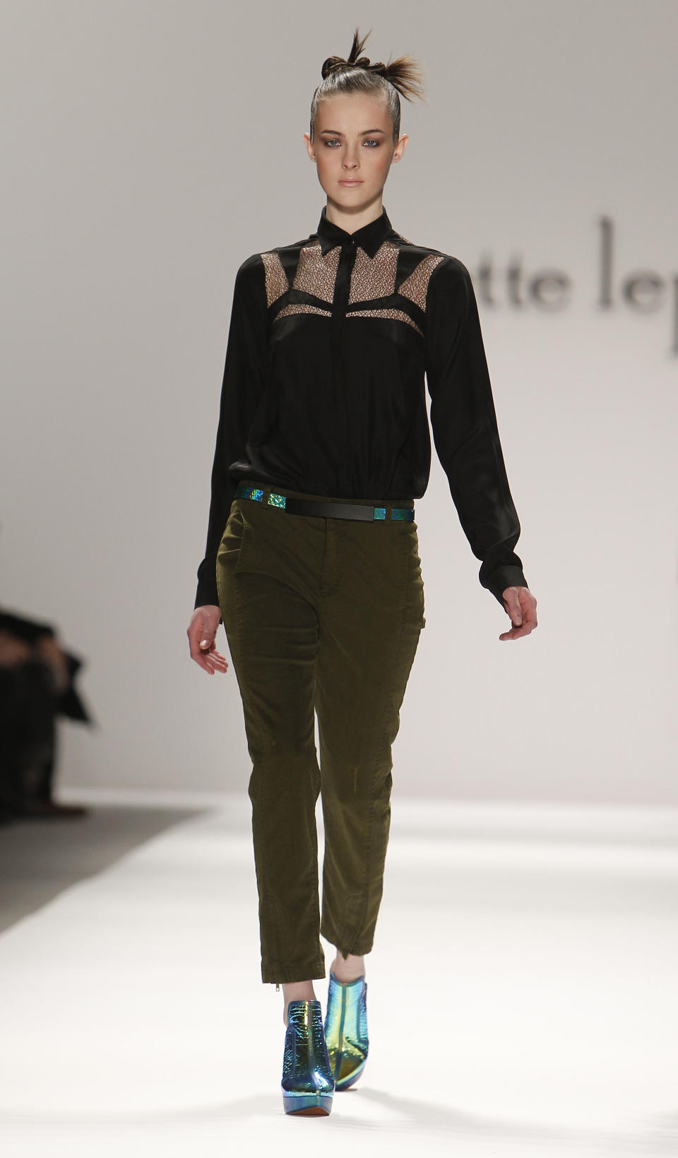 The Nanette Lepore Fall 2013 collection is modeled during Fashion Week, Wednesday, Feb. 13, 2013 in New York. (AP Photo/Jason DeCrow)