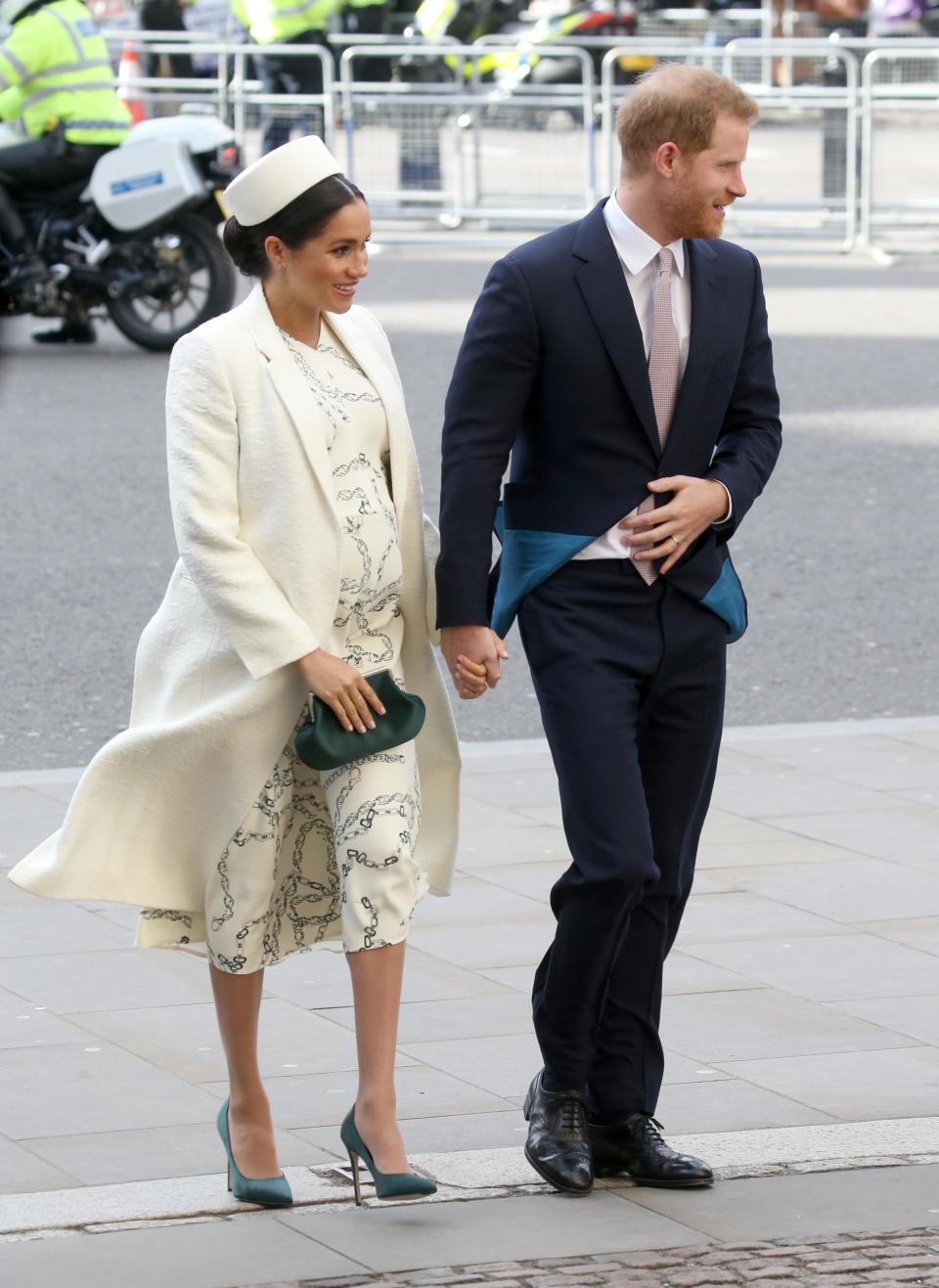 For the Commonwealth Day service, Meghan wore a cream chain print dress and coat by Victoria Beckham, with emerald green satin shoes and clutch, also by the British fashion designer [Photo: Getty]