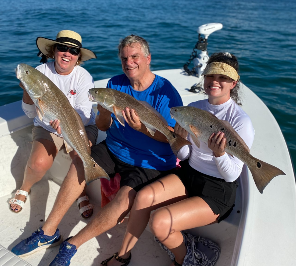 Three redfish, at least seven spots. Capt. Jeff Patterson put these folks on a set of reds caught from his Pole Dancer charter boat.