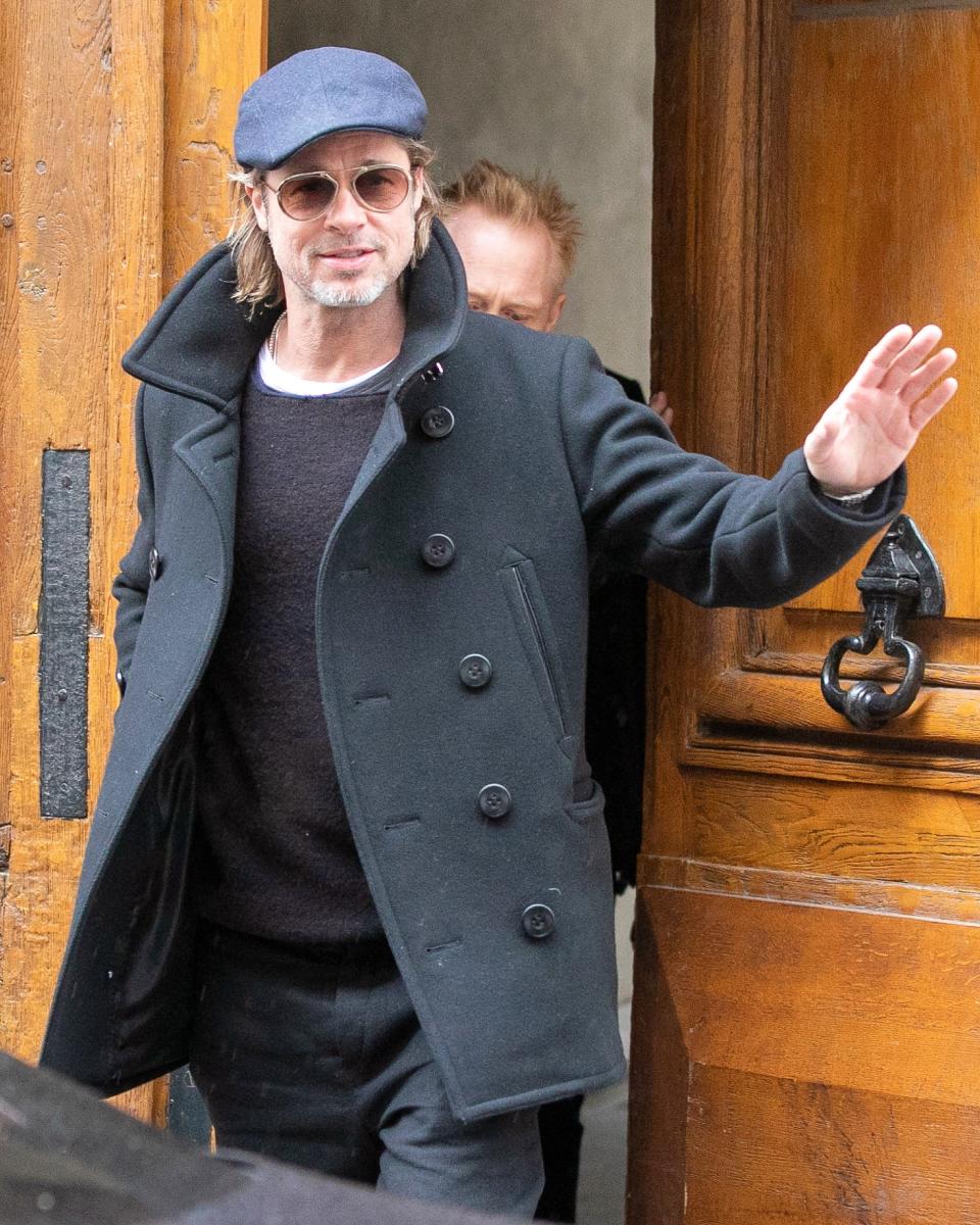 Brad Pitt knows the power of the peacoat.