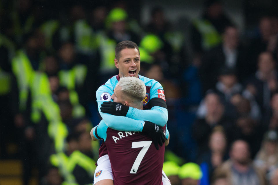 West Ham United’s Javier “Chicharito” Hernandez celebrates his goal at Chelsea with teammate Marko Arnautovic. (Getty)
