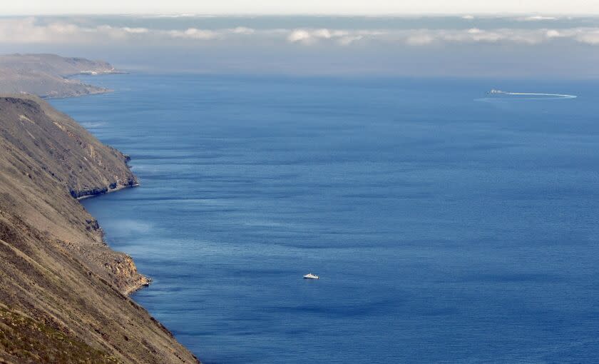 JULY 17, 2013. SAN CLEMENTE ISLAND, CA. A U.S. Navy destroyer cuts a circuitous path during a training exercise off the east coast of San Clemente Island. This view from the Stone Station high point on the 21-mile long island looks north. (Don Bartletti / Los Angeles Times)