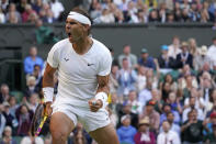 Spain's Rafael Nadal reacts after winning a point against Botic Van De Zandschulp of the Netherlands in a men's singles fourth round match on day eight of the Wimbledon tennis championships in London, Monday, July 4, 2022. (AP Photo/Alberto Pezzali)