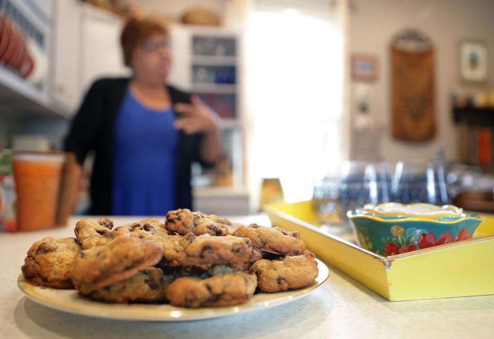 Cookies sit in the foreground of a 2020 conversation with Carmen Leal in Oshkosh. Leal donated food to her neighbors in an effort to offset food insecurity in her community, and was interviewed as part of the Stock the Shelves campaign, a partnership between USA TODAY NETWORK-Wisconsin newspapers and Feeding America Eastern Wisconsin. This year's campaign has a 750,000-meal goal, and runs Oct. 1 to 31.