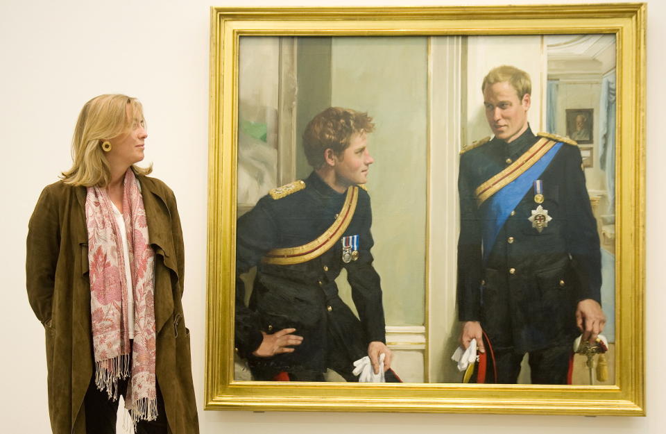 Nicky Philipps stands with her work, 'Prince William and Prince Harry: a new portrait by Nicky Philipps' at the National Portrait Gallery on Jan. 6, 2010.&nbsp; (Photo: LEON NEAL via Getty Images)
