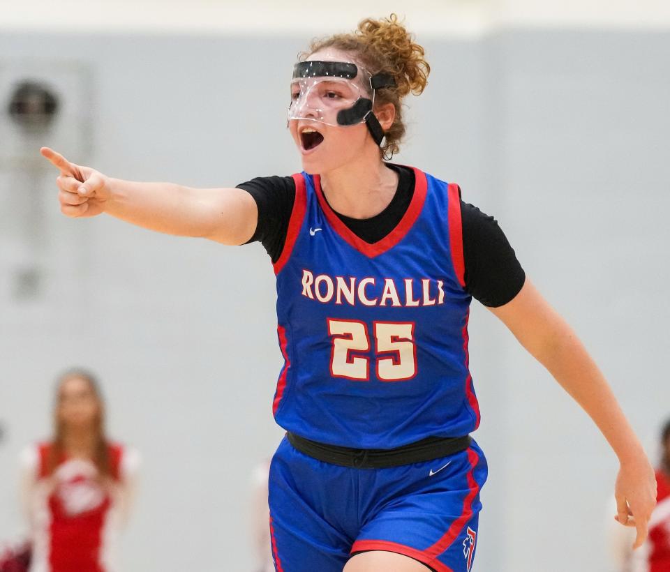 Roncalli Royals guard Elliot Leffler (25) yells in excitement Tuesday, Nov. 14, 2023, during the game at Pike High School in Indianapolis.