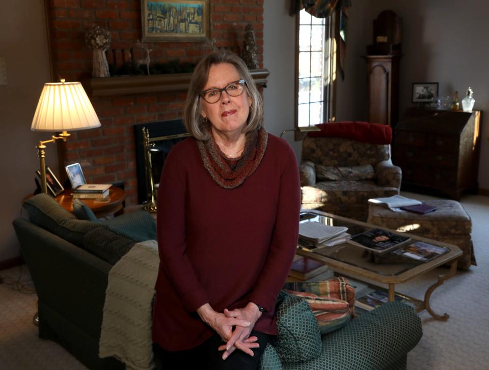 Karol Settergren in her Rochester Hills, Mich., home on Jan. 27, 2021. Settergren is retired but never applied for jobless benefits in 2020 and is currently looking at Form 1099-G for the jobless claims she didn't receive.