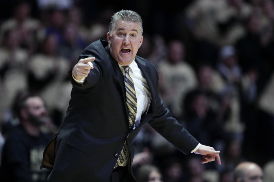 FILE - In this Jan. 27, 2019, file photo, Purdue head coach Matt Painter gestures during the first half of an NCAA college basketball game against Michigan State, in West Lafayette, Ind. Painter was named Coach of the Year in the Big Ten Conference, Tuesday, March 12, 2019. (AP Photo/Michael Conroy, File)