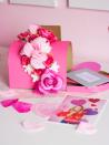 <p>What better place is there for Valentine's Day cards than a pink and red mailbox? Buy the mailbox already made, so all you need to do is decorate.</p><p><strong>Get the tutorial at <a href="https://designimprovised.com/2017/02/diy-floral-valentine-mailbox.html" rel="nofollow noopener" target="_blank" data-ylk="slk:Design Improvised" class="link rapid-noclick-resp">Design Improvised</a>.</strong> </p>
