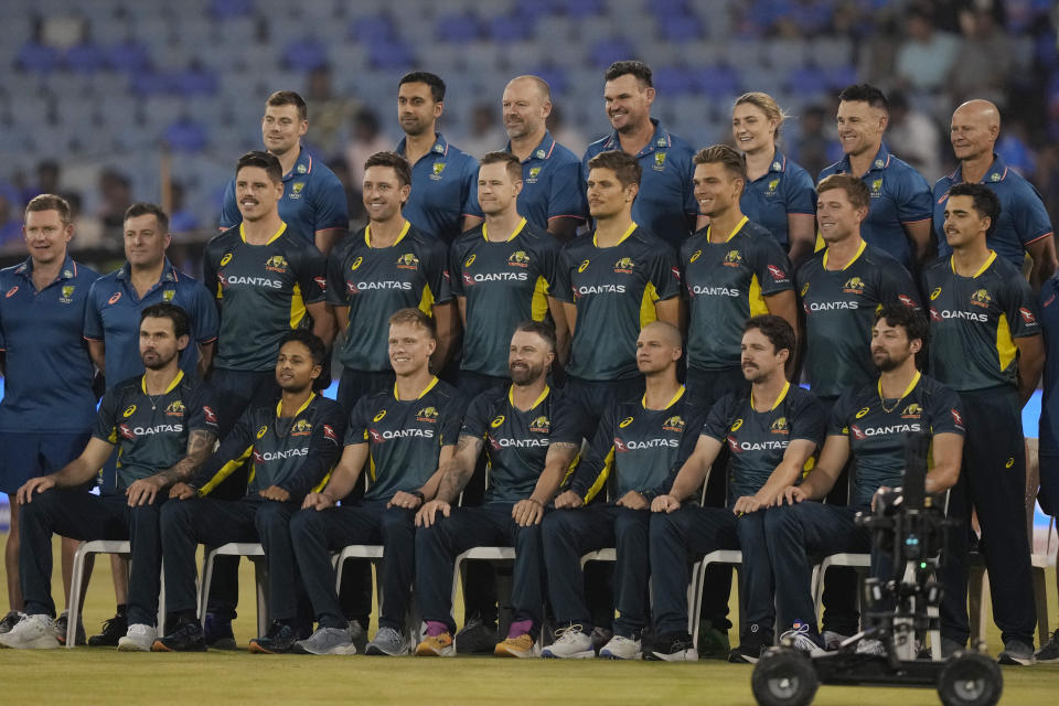 Australia's team members pose for a group photo before the fourth T20 cricket match between Australia and India in Raipur, India, Friday, Dec. 1, 2023. (AP Photo/Mahesh Kumar A.)