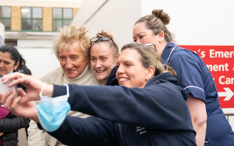 Rod Stewart poses for a selfie with nurses - Joe Giddens/PA