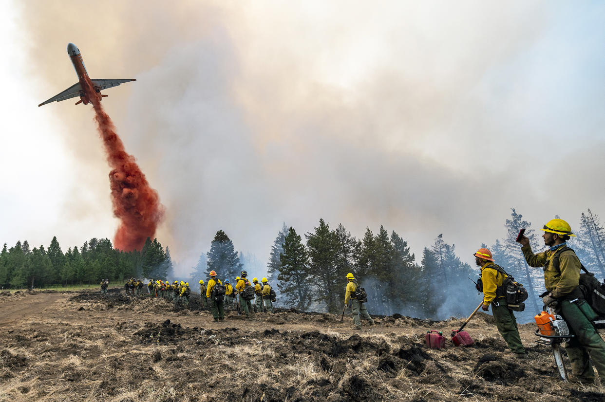 Image: Wildland firefighters (Pete Caster / Lewiston Tribune via AP file)