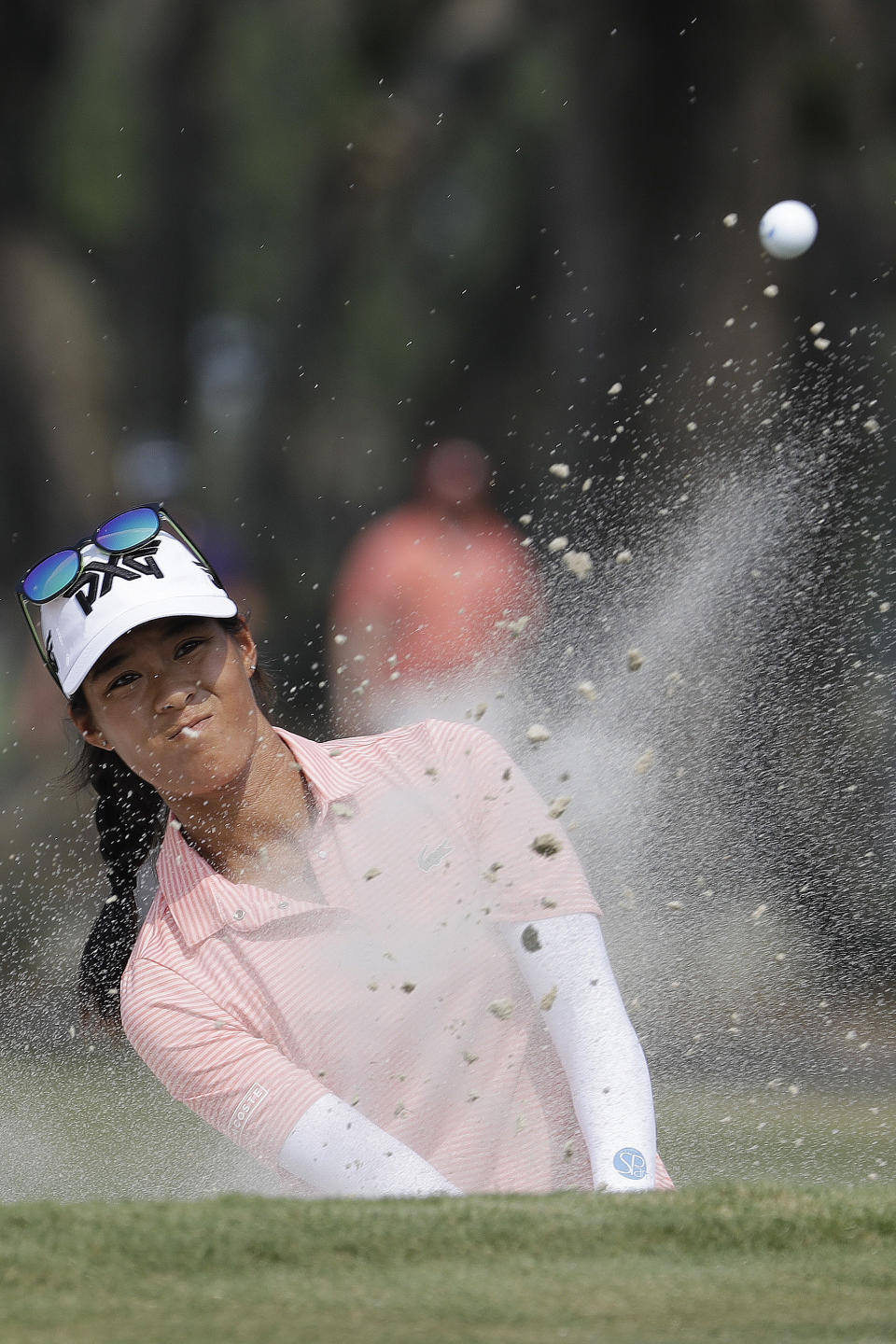 Celine Boutier of France, hits out of a bunker on the eight green during the final round of the U.S. Women's Open golf tournament, Sunday, June 2, 2019, in Charleston, S.C. (AP Photo/Steve Helber)