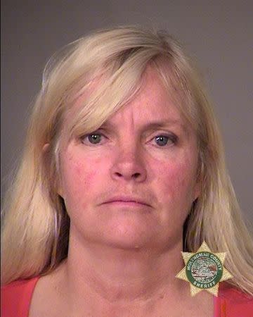 Shawna Cox is seen in a police jail booking photo released by the Multnomah County Sheriff's Office in Portland, Oregon January 27, 2016. REUTERS/MCSO/Handout via Reuters