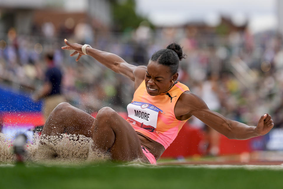 Olympic history for Jasmine Moore. She's the 1st US woman to qualify