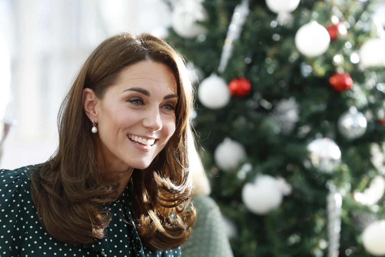 Duchess of Cambridge (pictured) wears a polka dot L.K. Bennett dress to a children’s hospital in London. [Photo: Getty]