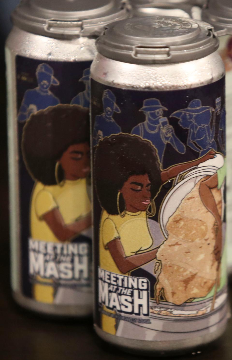 Cans of Meeting at the Mash, a collaboration between the Melanated Mash Makers and Attic Brewing.