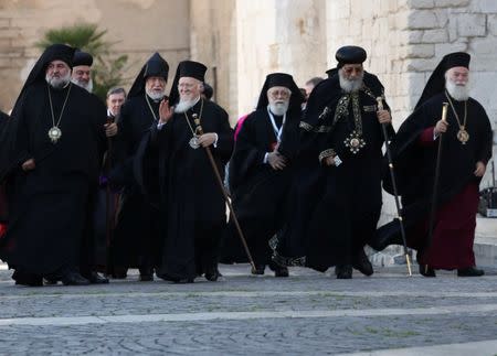 Patriarchs of the churches of the Middle East arrive at the St. Nicholas Basilica in Bari, southern Italy July 7, 2018. REUTERS/Tony Gentile