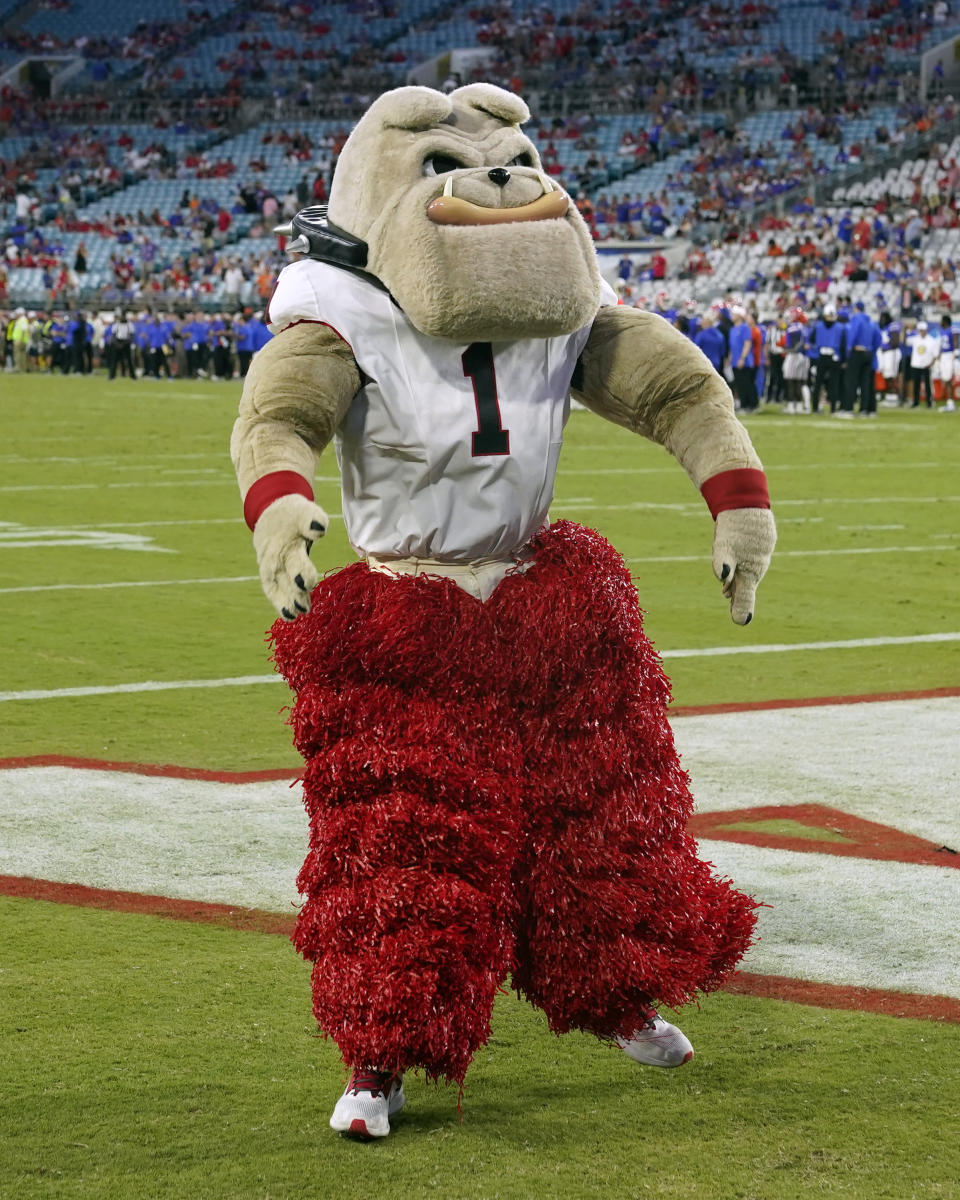The Georgia mascot dances on the field during a timeout in the final moments of an NCAA college football game against Florida, Saturday, Oct. 28, 2023, in Jacksonville, Fla. (AP Photo/John Raoux)