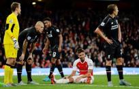 Football - Arsenal v Liverpool - Barclays Premier League - Emirates Stadium - 24/8/15 Arsenal's Olivier Giroud looks dejected after missing a chance to score as Liverpool's Martin Skrtel, Simon Mignolet and Lucas Leiva look on Action Images via Reuters / Tony O'Brien Livepic