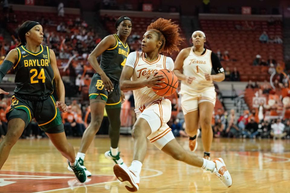 Texas guard Rori Harmon (3) drives to the basket against Baylor guard Sarah Andrews (24) during their 2022 game at Frank C. Erwin Jr. Center.