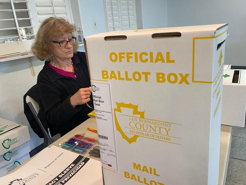 A Primary Election Day poll worker oversees a voting site in Apple Valley on Tuesday, March 5.