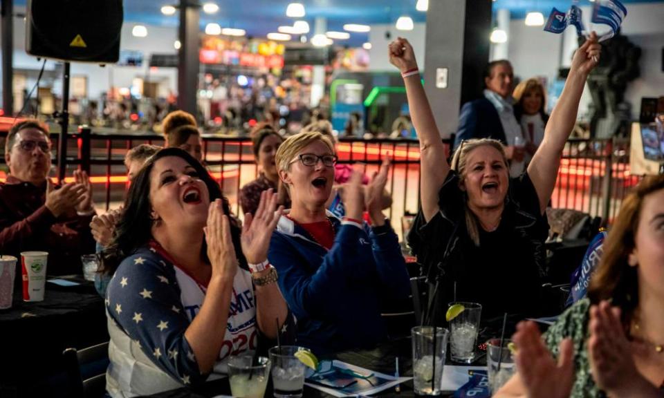 People watch the 2020 election results roll in at a bar in Austin, Texas.