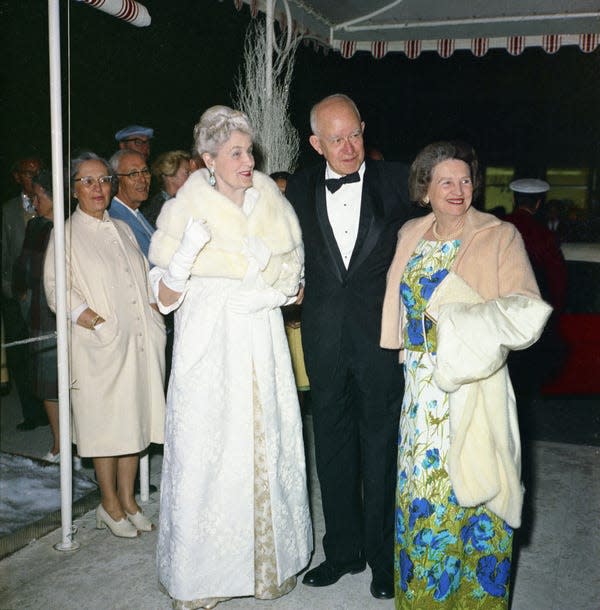 Marjorie Merriweather Post (left) stands with Gen. Omar Bradley and his wife Mary Bradley at the Red Cross Ball in Palm Beach on Jan. 31, 1965. Bradley was the first chairman of the Joint Chiefs of Staff. This would have been four years before the events of "Palm Royale."